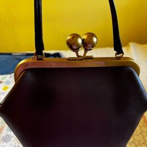 Coach Kiss Lock 16 In Black Currant Leather